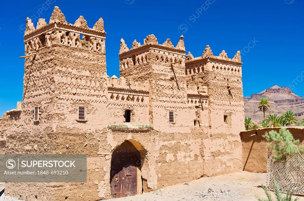 Traditional kasbah, mud fortress, mud brick building of the Berber tribes, Tighremt, with ornaments, Agdz, Draa-Valley, Southern Morocco, Morocco, Afr...