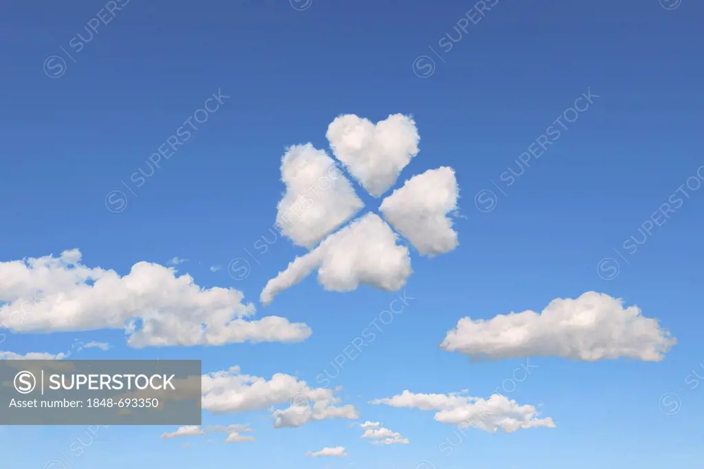 Cloud formations in the shape of a four-leafed clover, illustration