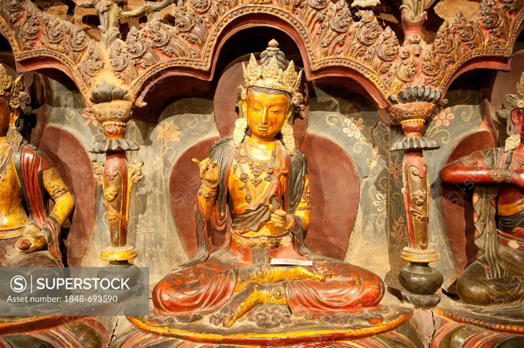 Tibetan Buddhism, Newari-style sculptures, colourfully painted statues made of wood and clay, yellow Buddha statue, Palcho Monastery, also known as Pe...