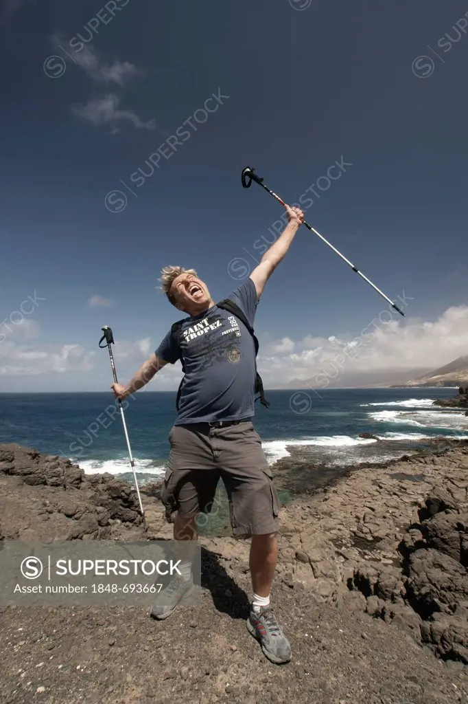 Carefree man, Nordic walking, Punta de Jandia, Puerto de la Cruz, Jandia, nature park, national park, Fuerteventura, Canary Islands, Spain, Europe
