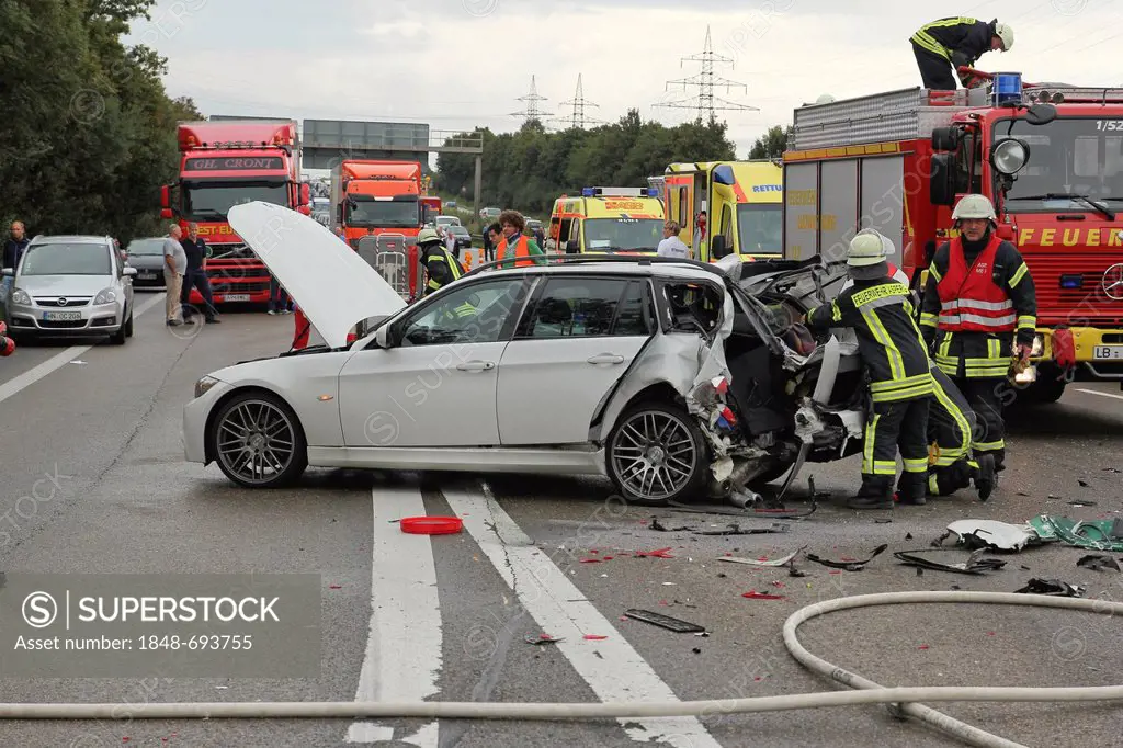 Firefighters in a rescue operation following a serious road traffic accident on the Autobahn A81 motorway, Ludwigsburg, Baden-Wuerttemberg, Germany, E...