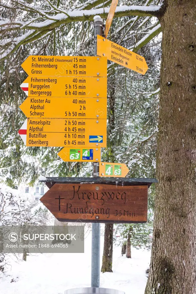 Signpost, Kreuzweg, Rundgang, German for circuit of the Stations of the Cross, in the snow, Einsiedeln, Switzerland, Europe