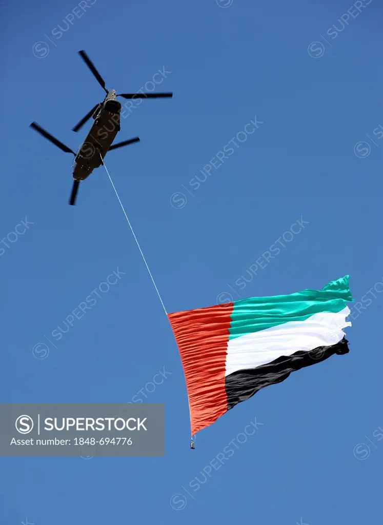 Military show, helicopters of the United Arab Emirates army presenting a large national flag, Abu Dhabi, United Arab Emirates, Middle East