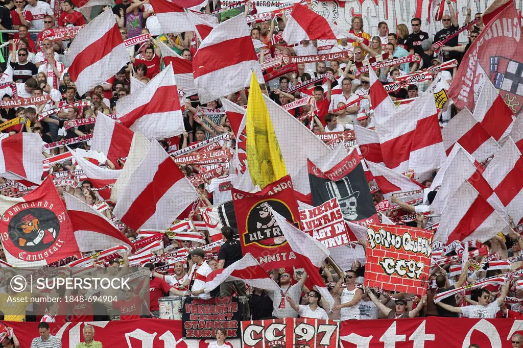 Red and white sea of flags in the stands of the Stuttgart fans, VfB Stuttgart football club, Mercedes-Benz Arena, Stuttgart, Baden-Wuerttemberg, Germa...