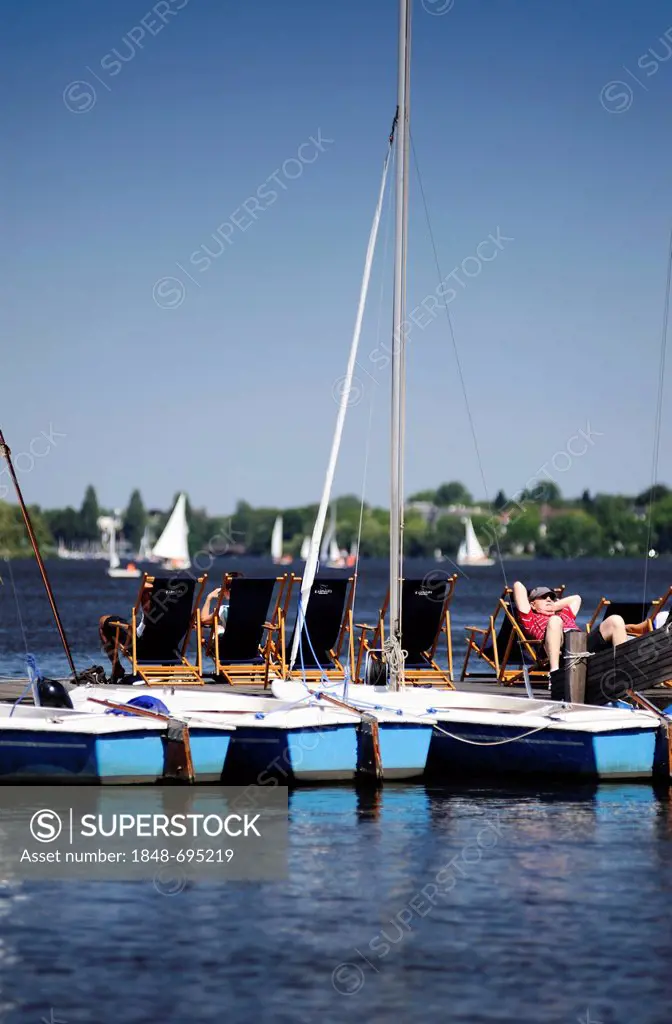 Sailing boats and a jetty with deck chairs, Outer Alster lake in St. Georg district, Hamburg, Germany, Europe