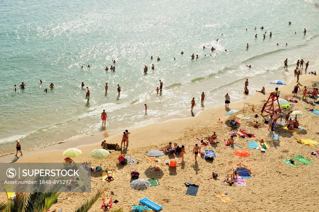 Bathers on Playa Poniente beach, mass tourism, Benidorm, Costa Blanca, Spain, Europe