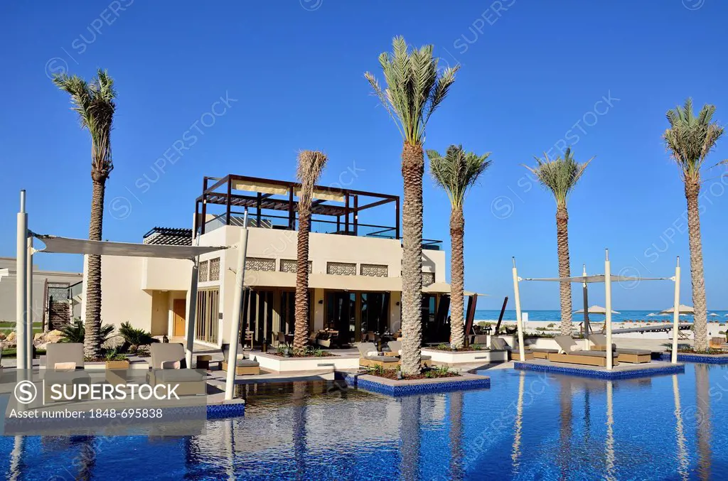 Swimming pool of the Park Hyatt hotel on Saadiyat Island, Abu Dhabi, United Arab Emirates, Arabian Peninsula, Asia