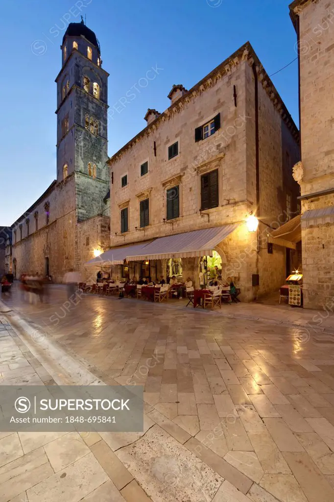 Restaurants in Stradun or Placa, main street, in the old town of Dubrovnik, Franciscan Monastery at back, UNESCO World Heritage Site, central Dalmatia...