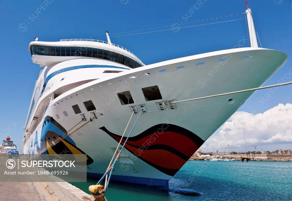 Brightly painted cruise ship, AIDA, in the port of Civitavecchia, Rome, Italy, Europe