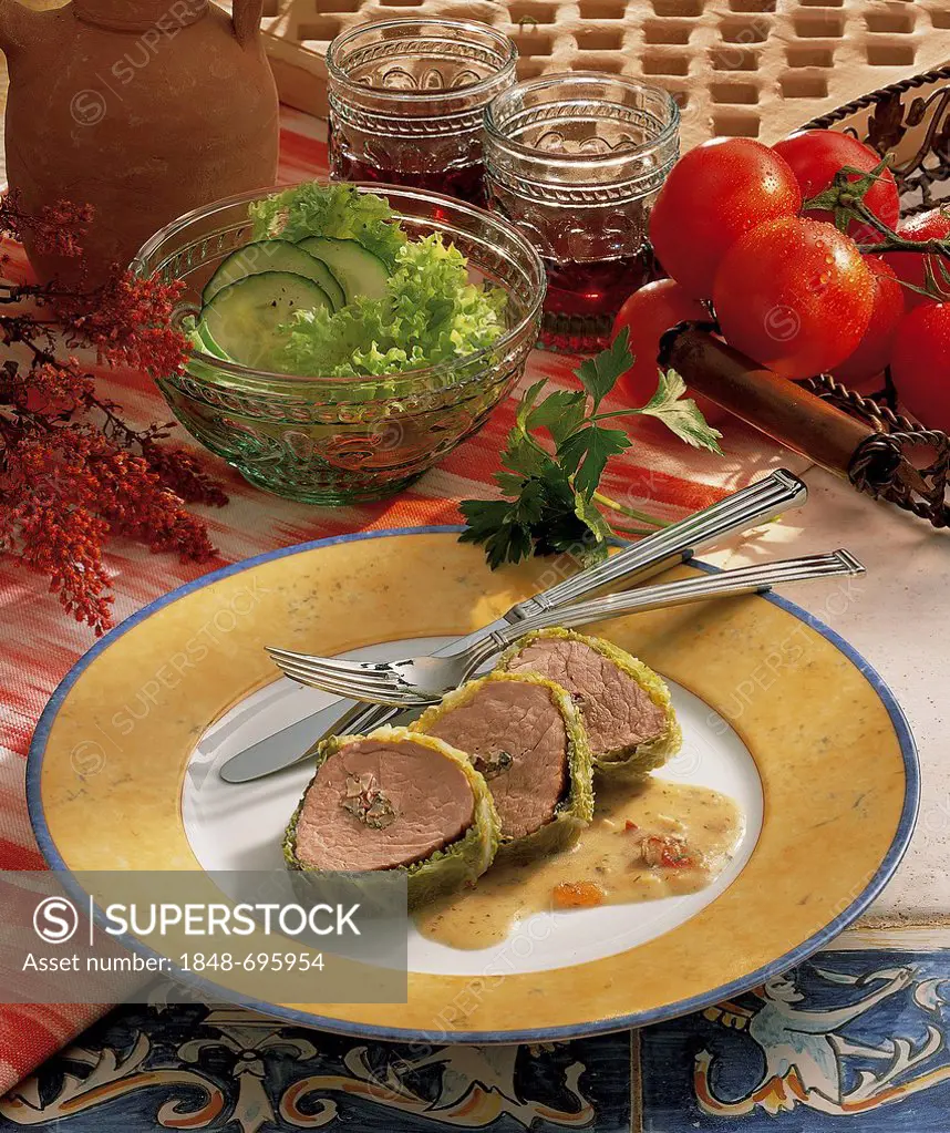 Pork fillet wrapped in savoy cabbage with sherry sauce, Spain