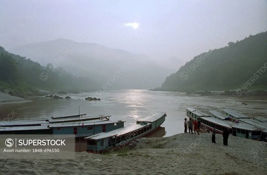 Transport boats on the Mekong river in the early morning, Pakbeng, Laos, Southeast Asia, Asi