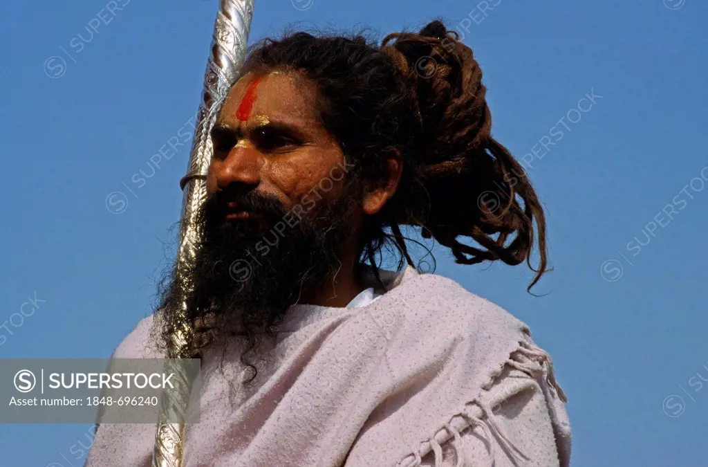 Portrait of a sadhu, joining the Maha Khumba Mela at the confluence of the Rivers Ganges, Yamuna and Saraswati in Allahabad, Uttar Pradesh, India, Asi...