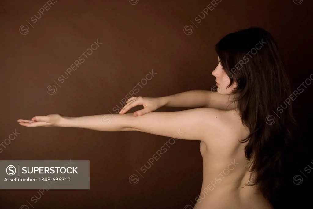 Woman, back, naked, arms outstretched