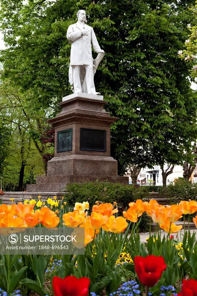 Monument to Kaiser Wilhelm I, with tulip beds in the spa gardens, Bad Ems an der Lahn, Rhineland-Palatinate, Germany, Europe