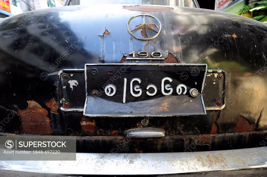 License plate with Burmese characters, old rusty Mercedes classic car, Yangon, Burma also known as Myanmar, Southeast Asia, Asia