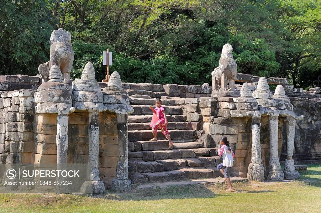 Khmer children on the Elephant Terraces of Angkor Thom, Cambodia, Southeast Asia, Asia