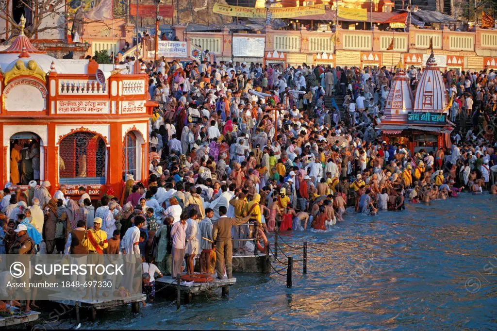 During Kumbha Mela or Kumbh Mela, the pilgrims are taking a bath in the Ganges river, Har Ki Pauri-Ghat, famous bathing ghat at Haridwar or Hardwar, U...