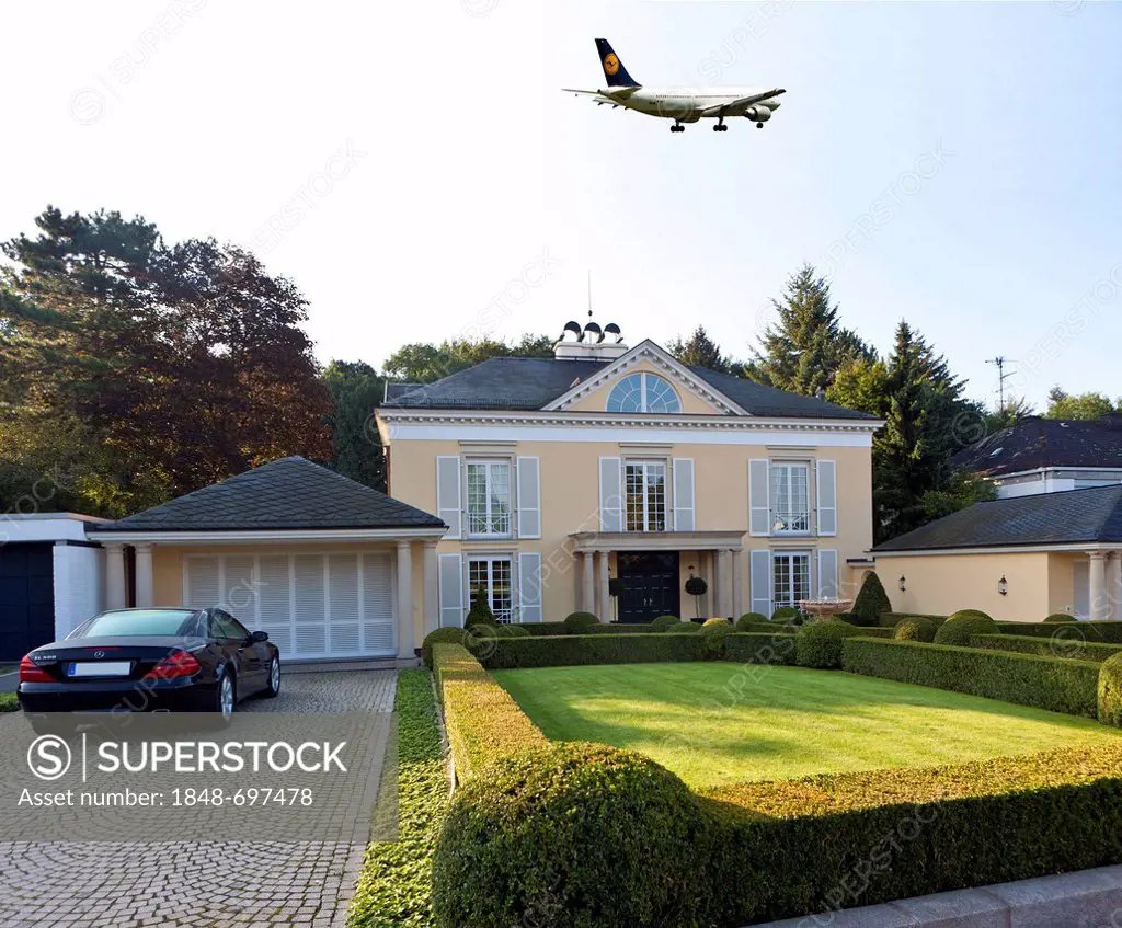 Plane over Lerchesberg, luxury residential area with aircraft noise from the runway Nordwest 07L 25R, the new runway at Frankfurt Airport, symbolic im...
