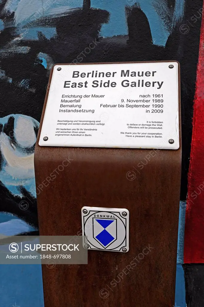 Monument sign in front of the East Side Gallery, remains of the Berlin Wall, Berlin-Friedrichshain, Germany, Europe
