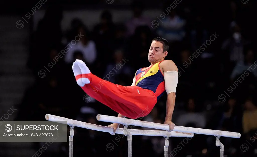 Rafael Martinez, ESP, performing on parallel bars, EnBW Gymnastics World Cup, 11 to 13 Nov 2011, 29th DTB Cup, Porsche-Arena, Stuttgart, Baden-Wuertte...