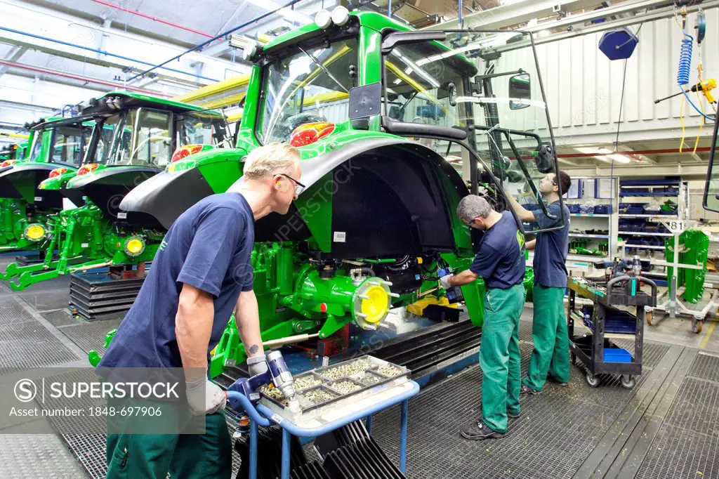 Assembly of doors in the tractor production section at the European headquarters of the American agricultural machinery manufacturer John Deere, Deere...