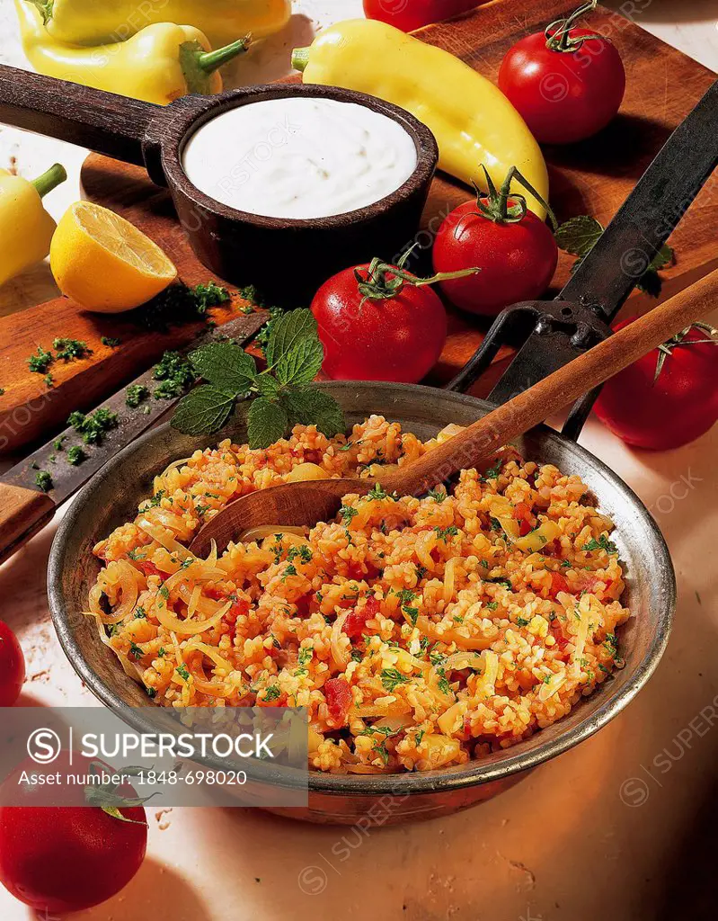 Vegetable bulgur with mint, onions, peppers, tomatoes, chili peppers, whole food cuisine, Turkey