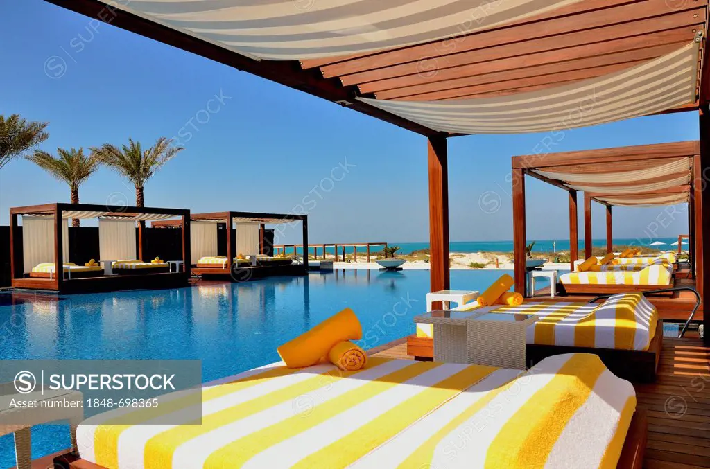 Swimming pool of the Monte Carlo Beach Club on Saadiyat Island, Abu Dhabi, United Arab Emirates, Arabian Peninsula, Asia