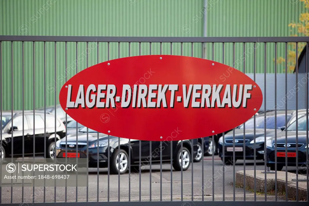 Lager-Direkt-Verkauf, German for 'sales from stock' written on advertising sign of a car dealer, Cologne, North Rhine-Westphalia, Germany, Europe, Pub...