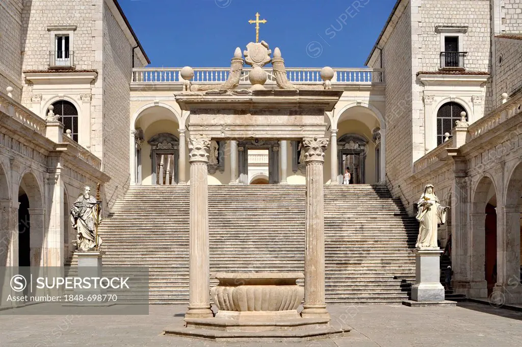 Cistern and statues of St. Benedict and St. Scholastica in the Cloister of Bramante, Benedictine abbey of Montecassino, Monte Cassino, Cassino, Lazio,...