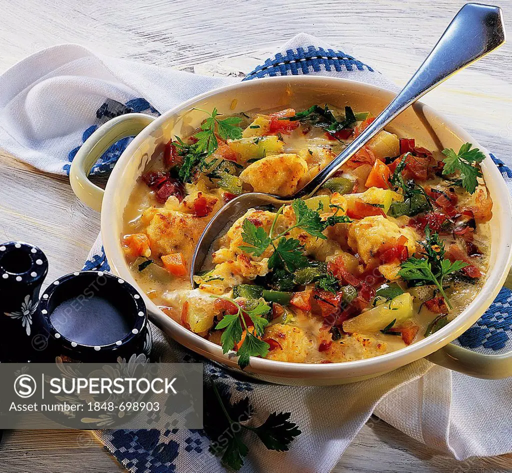 Casserole of scrambled eggs with vegetables and ham, made of spring onions, tomatoes, bell peppers, turnip cabbage and carrots, Hungary