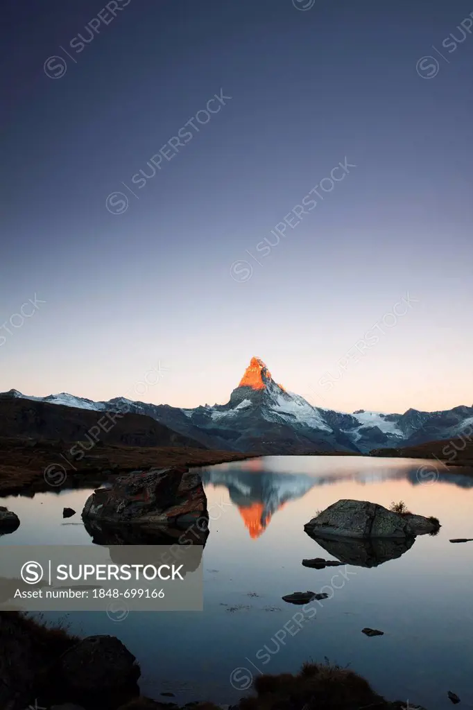 Mt Matterhorn at sunrise, reflection in Stellisee Lake, Zermatt, Canton Valais, Switzerland, Europe, PublicGround