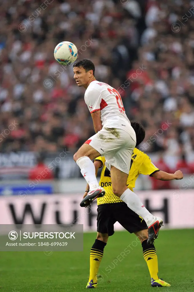 Duel between Khalid Boulahrouz of VfB Stuttgart, top, and Shinji Kagawa of Borussia Dortmund, bottom, Mercedes-Benz Arena, Stuttgart, Baden-Wuerttembe...