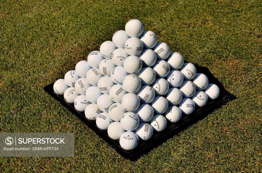 Pyramidal stacked golf balls in the Saadiyat Beach Golf Club on Saadiyat Island, Abu Dhabi, United Arab Emirates, Arabian Peninsula, Asia