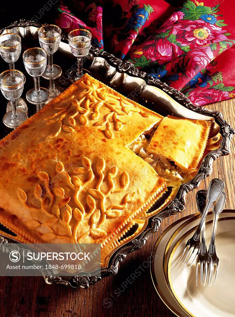 Caucasian cabbage pie, pastry filled with cabbage, onions, hard boiled eggs and raisins, Russia