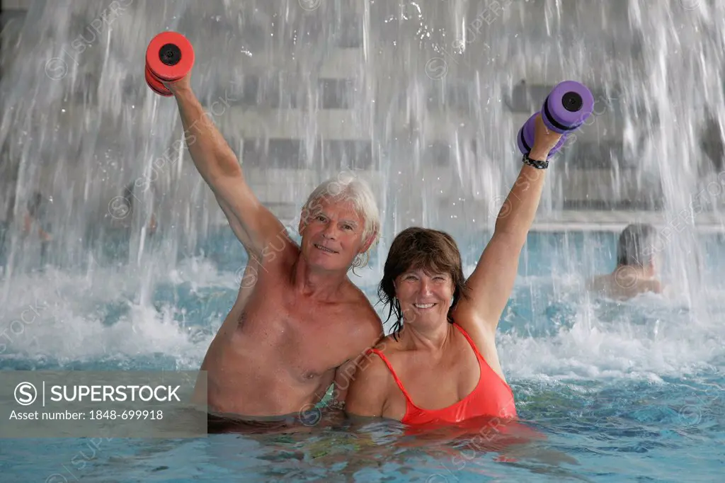 Senior couple doing senior sports in the Roland Matthes swimming hall in Erfurt, Thuringia, Germany, Europe