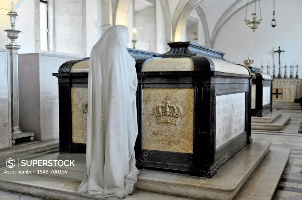 Stone sculpture of a woman praying at the grave of Carlos I, Tomb of the House of Braganza, Sao Vicente de Fora Monastery, built until 1624, old town,...