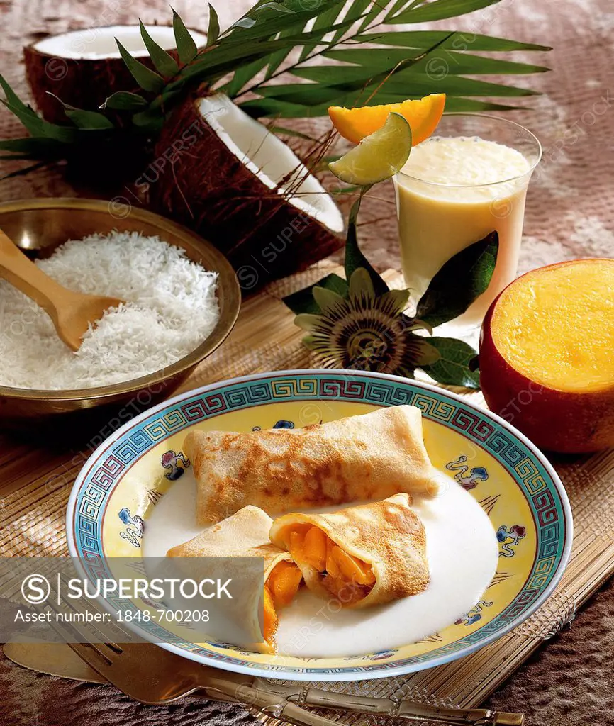 Rice pancakes with mango and coconut sauce, Indonesia