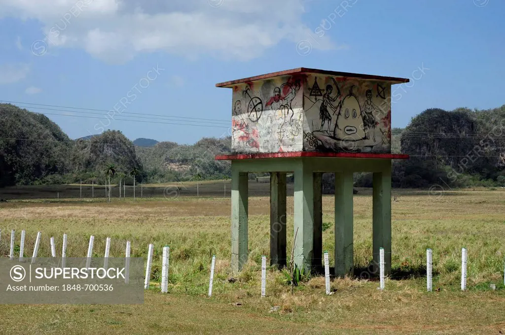 Water tower with graffiti, Valle de Vinales, Pinar del Rio province, Cuba, Greater Antilles, Caribbean, Central America, America