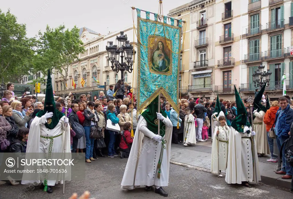 Penitents with crosses at the Semana Santa procession, Holy Week, Barcelona, Catalonia, Spain, Europe