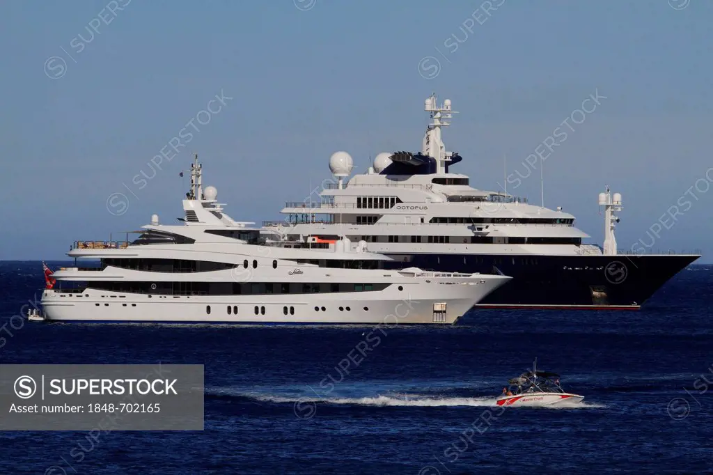 Motor yachts, Natita, built by Oceanco, length of 66 metres, built in 2005, in front of Octopus, built by Luerssen Yachts, length of 126.20 metres, bu...