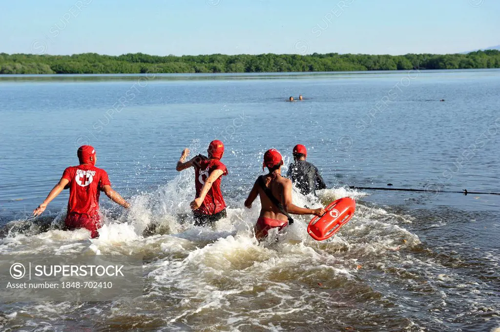 Red Cross lifeguards exercising in the Bahia de Jiquilisco bay, El Salvador is the country most vulnerable to natural disasters in the world, El Angel...