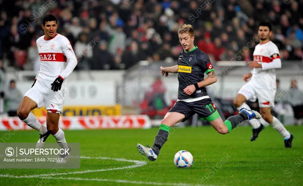 Marco Reus from Borussia Moenchengladbach shooting the goal for the score of 0:2, in front of Maza, VfB Stuttgart, left, and Serdar Tasci, VfB Stuttga...
