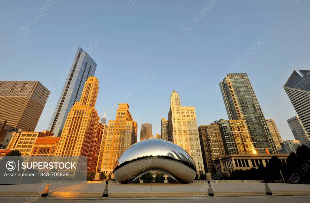 Cloud Gate sculpture, The Bean by Anish Kapoor, in front of the skyline with Legacy at Millennium Park Building, The Heritage, Pittfield Building, AT&...
