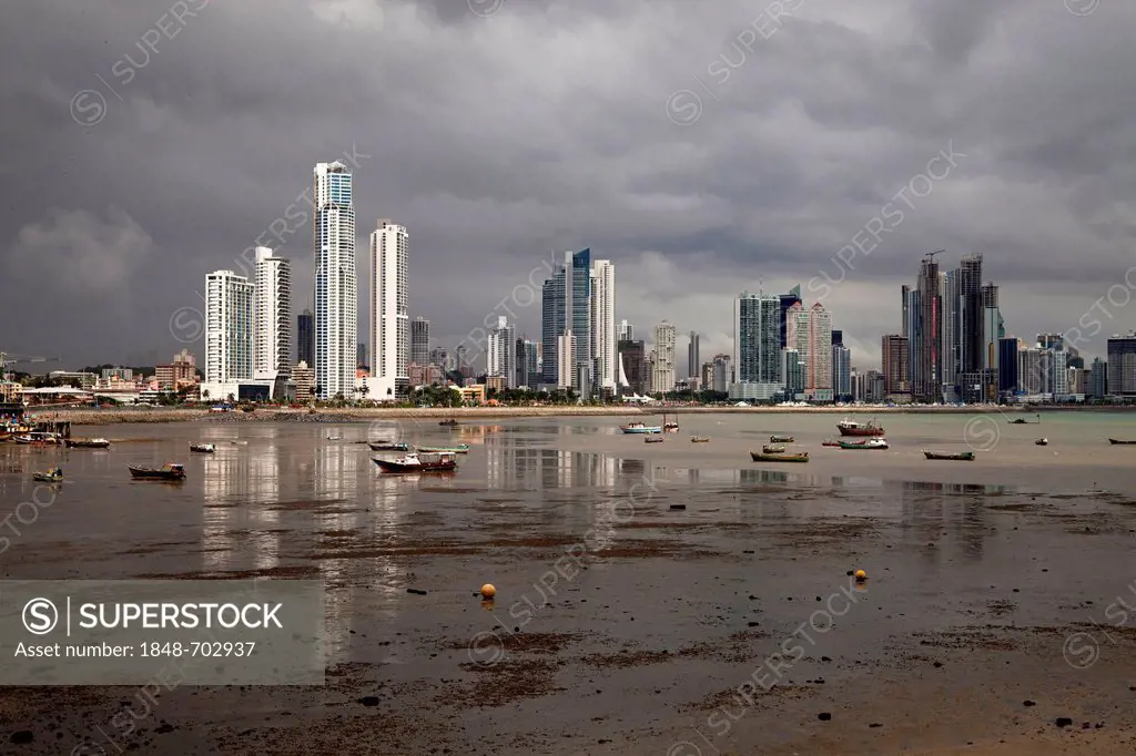 Dark storm clouds over the skyline of Panama City, Panama, Central America