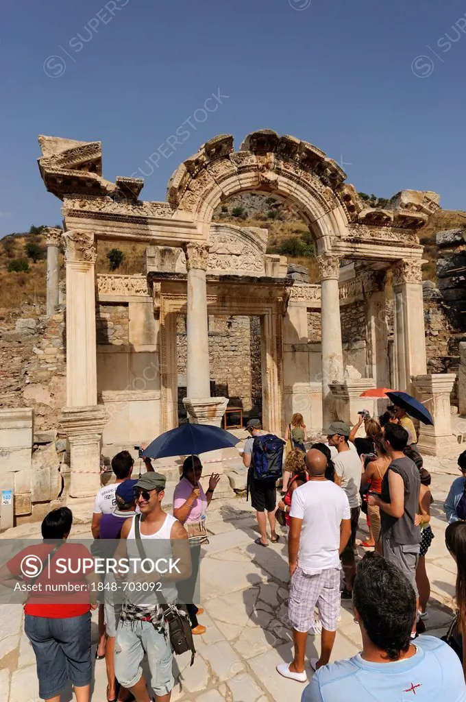 Hadrian's Temple on Curetes Street with tourist group, excavations, ruins at Ephesus, Efes, World Heritage Site, Selcuk, Lycia, Southwest Turkey, West...