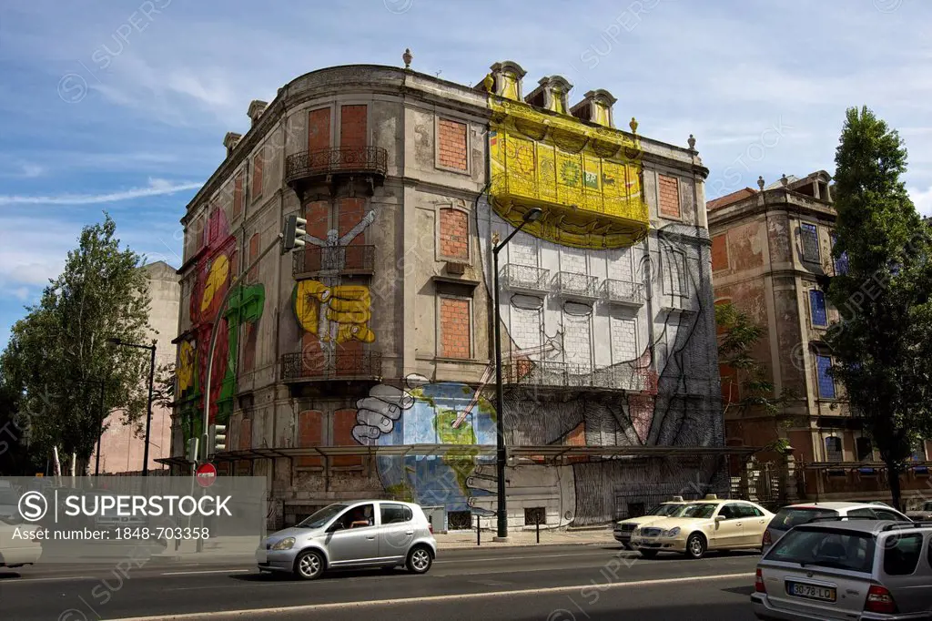 House with murals and graffiti by environmental activists, Lisbon, Portugal, Europe