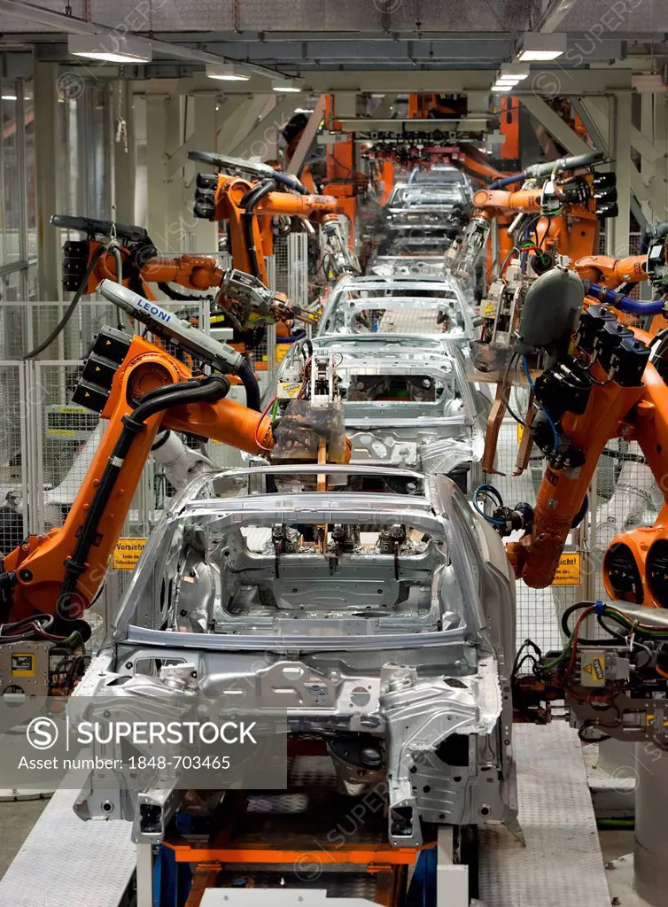 Industrial robots putting out car bodies on assembly line 2, Audi A4 Sedan, A4 Avant, A5 Coupe, A5 Sportback and RS5, Audi plant in Ingolstadt, Bavari...