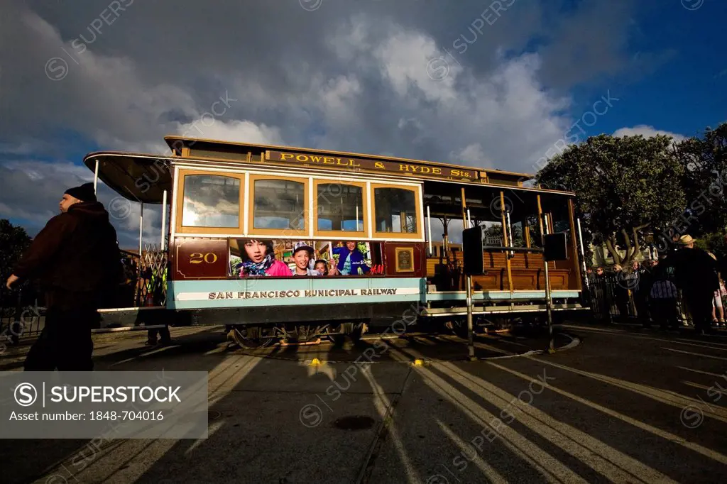 Old cable car of the San Francisco Municipal Railway, Muni, on turntable at final stop, San Francisco, California, USA