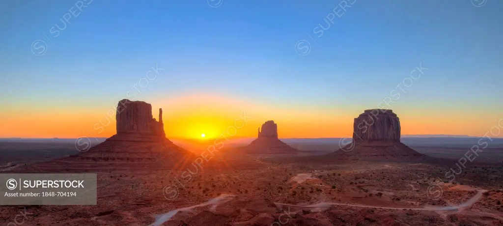 Panoramic view, sunrise at the mesas of West Mitten Butte, East Mitten Butte, Merrick Butte, Scenic Drive, Monument Valley, Navajo Tribal Park, Navajo...