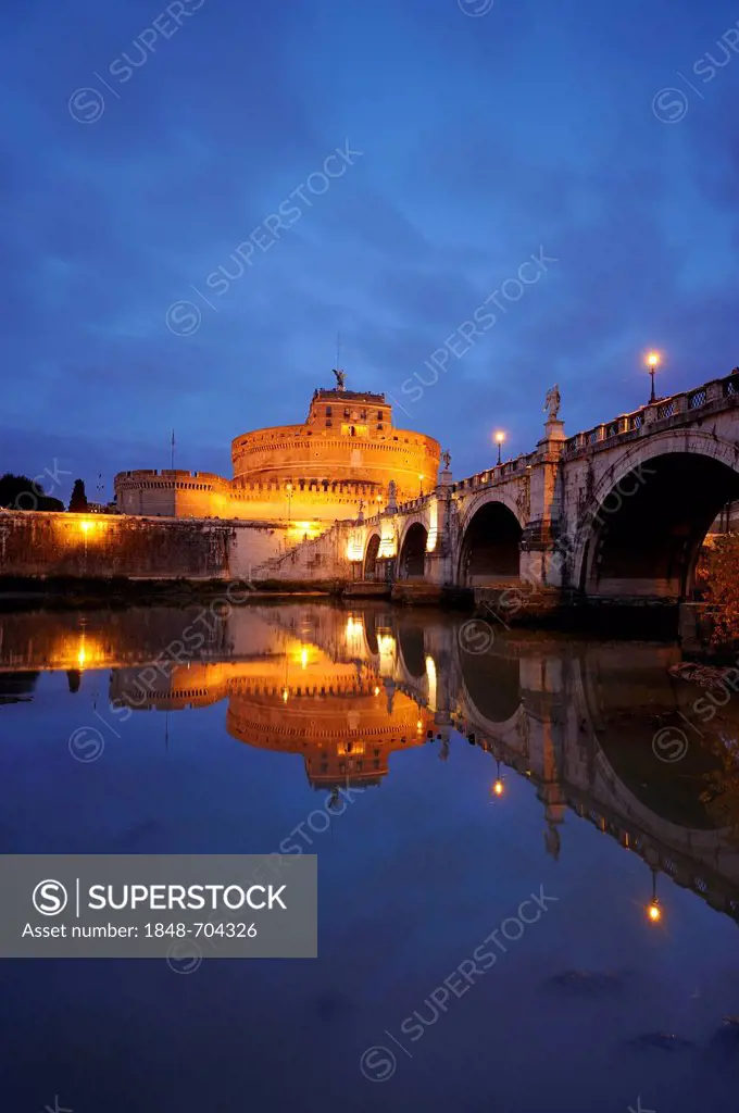 Castel Sant'Angelo and Ponte Sant'Angelo reflected in the Tiber river at dusk, Rome, Italy, Europe